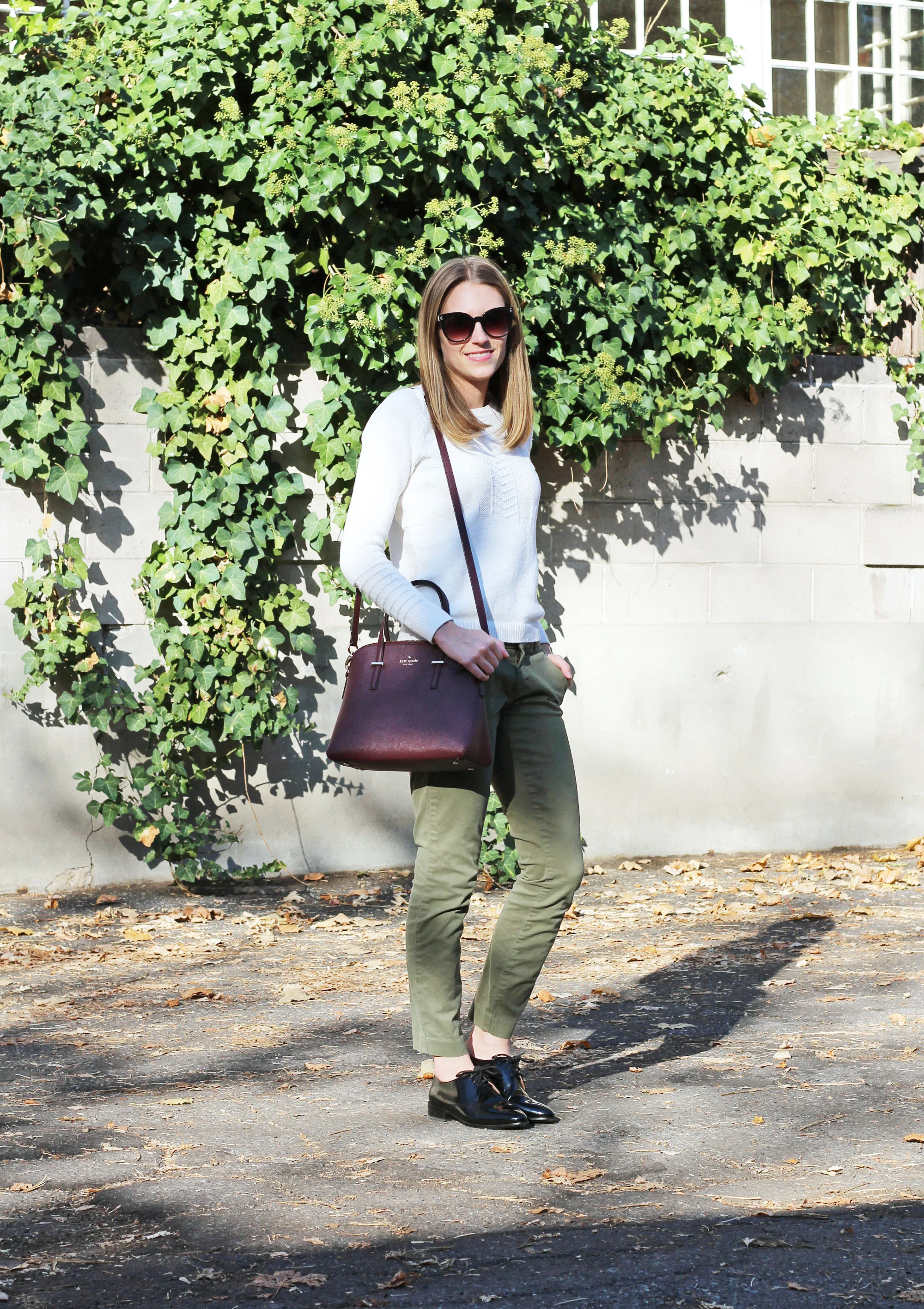Green pants shop black sweater
